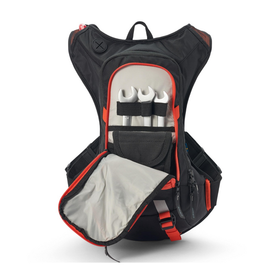 Hydration pack with small pocket for tools