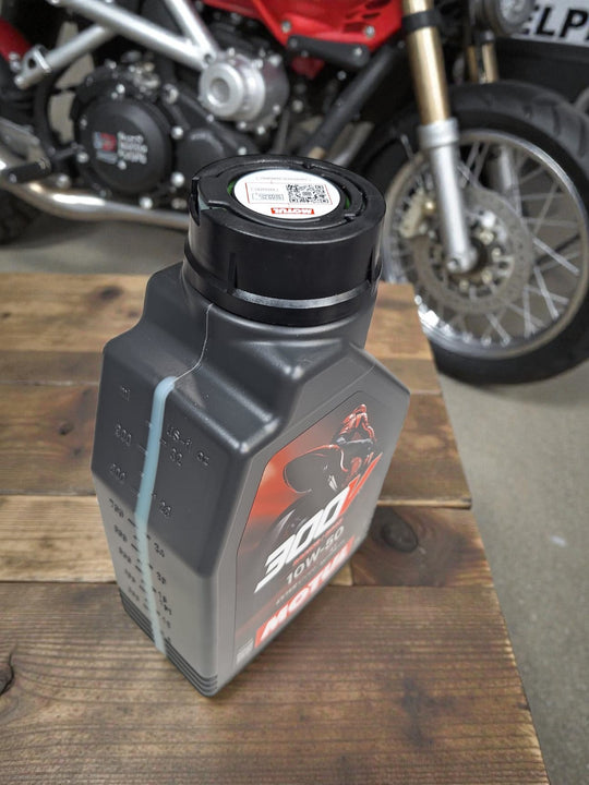 Motul 15W50 4T Fully Synthetic Lubricant Oil.